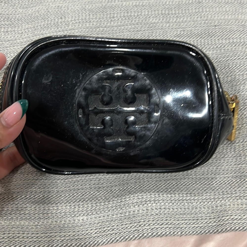 Black patent leather cosmetic pouch with zip